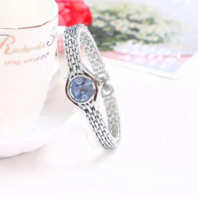 Golden Luxury Women's Bracelet Watch with Elegant Small Dial Quartz Design
