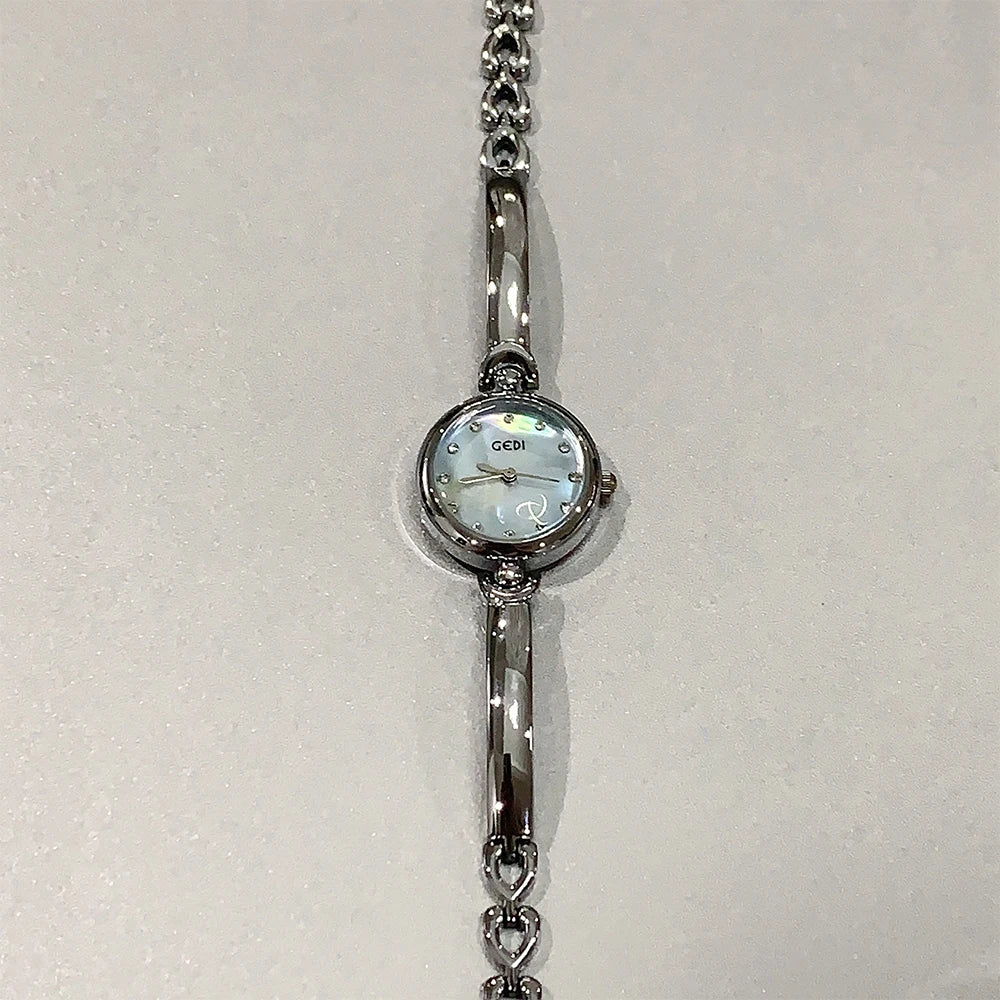 Minimalist Silver Women's Bracelet Watch with Small Round Dial Quartz Design