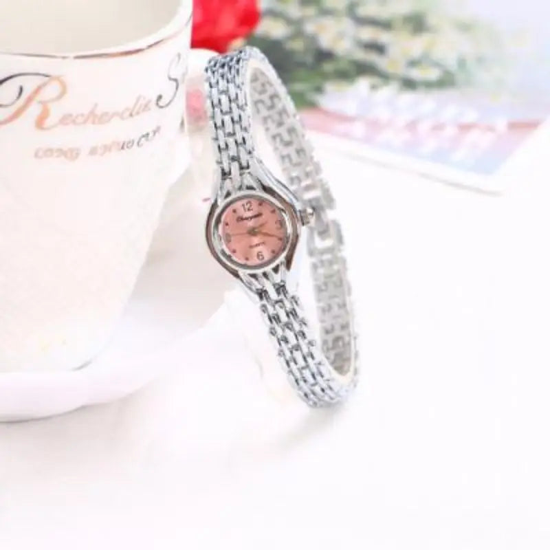 Golden Luxury Women's Bracelet Watch with Elegant Small Dial Quartz Design